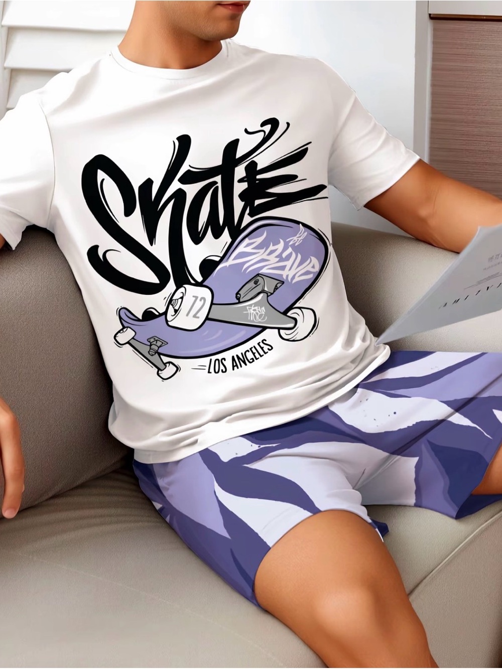 White 'Skate' Graphic Tee with Purple Skateboard Print